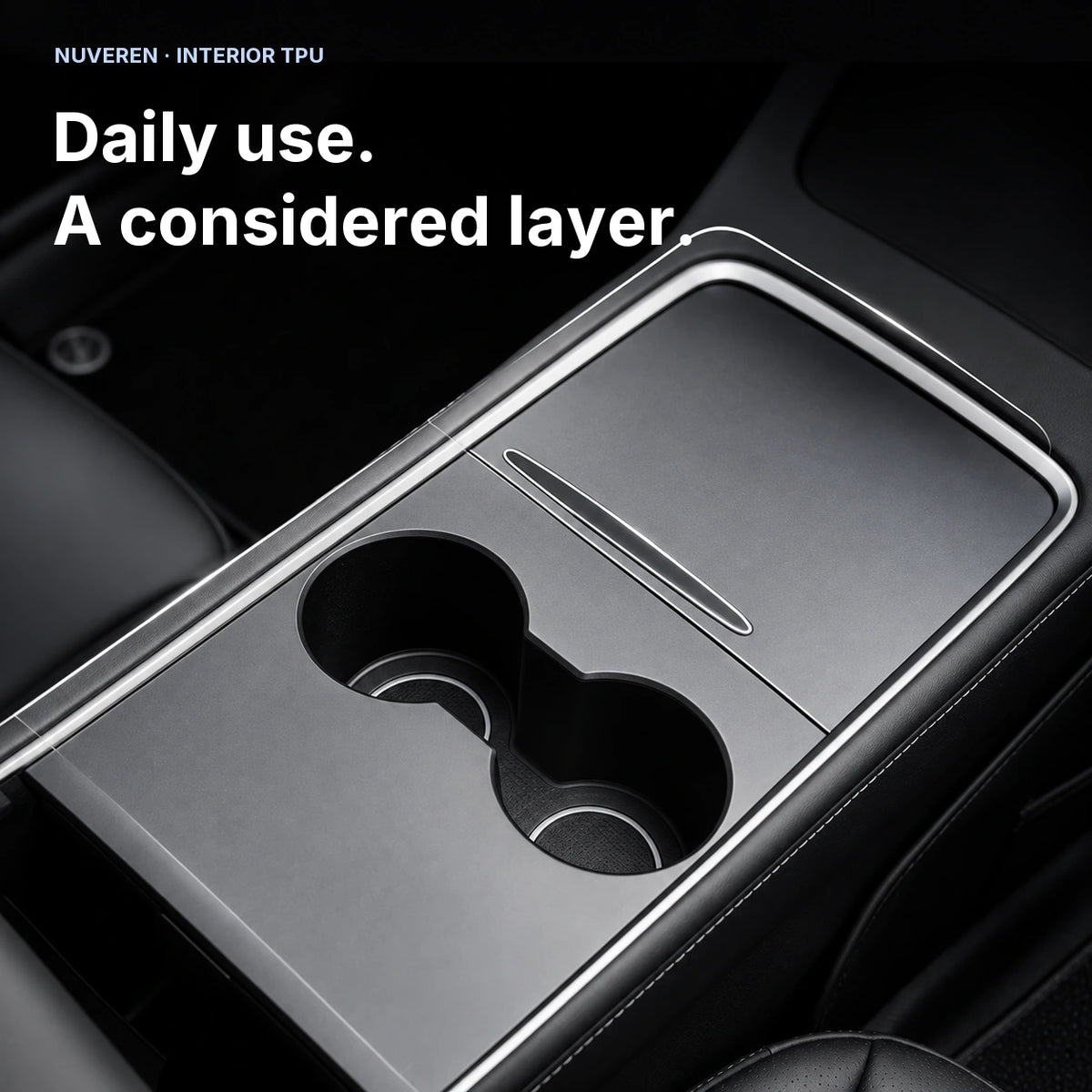 Illustrated 2021-style Tesla center console with exposed cupholders; context for selected surface protection.