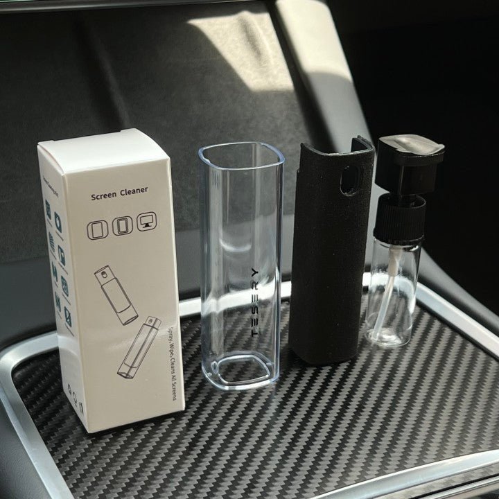 Disassembled black screen cleaner with empty refillable bottle