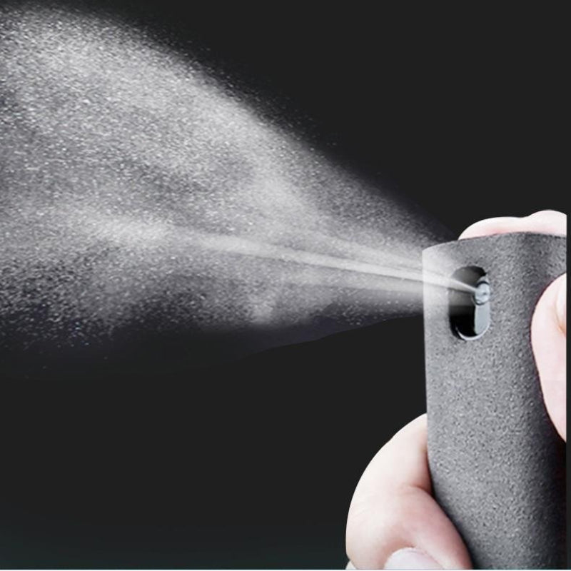 Close-up of screen-cleaner spray demonstration; liquid not included