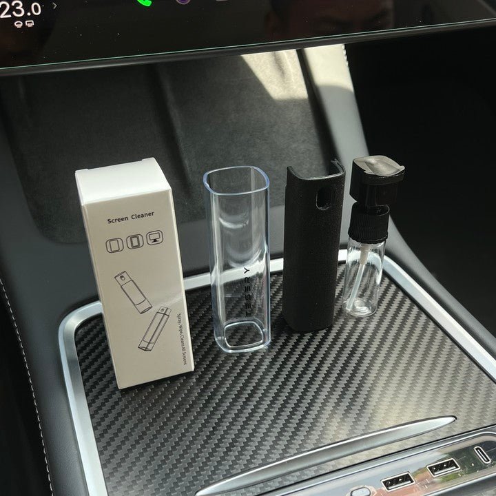 Original screen-cleaner components displayed in vehicle interior
