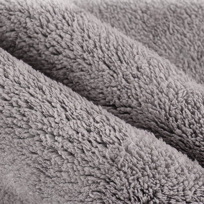 Close-up of the grey plush microfiber texture